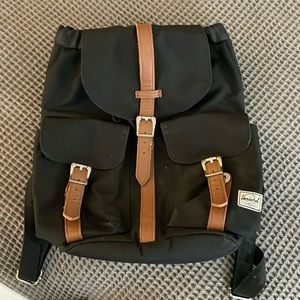 Herschel Dawson backpack in black with faux tan leather trim. Used